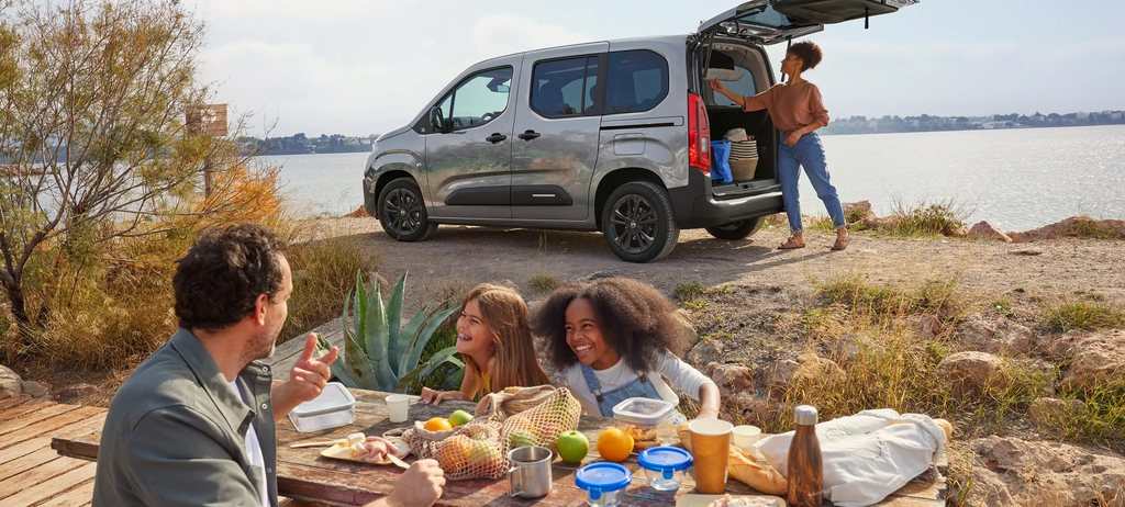 Side view Berlingo 30 with open boot showing spacious loading area, practicality, safety, efficiency and confident family use