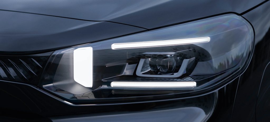 Close‑up of the Citroën SpaceTourer front headlight showing its modern LED lighting design